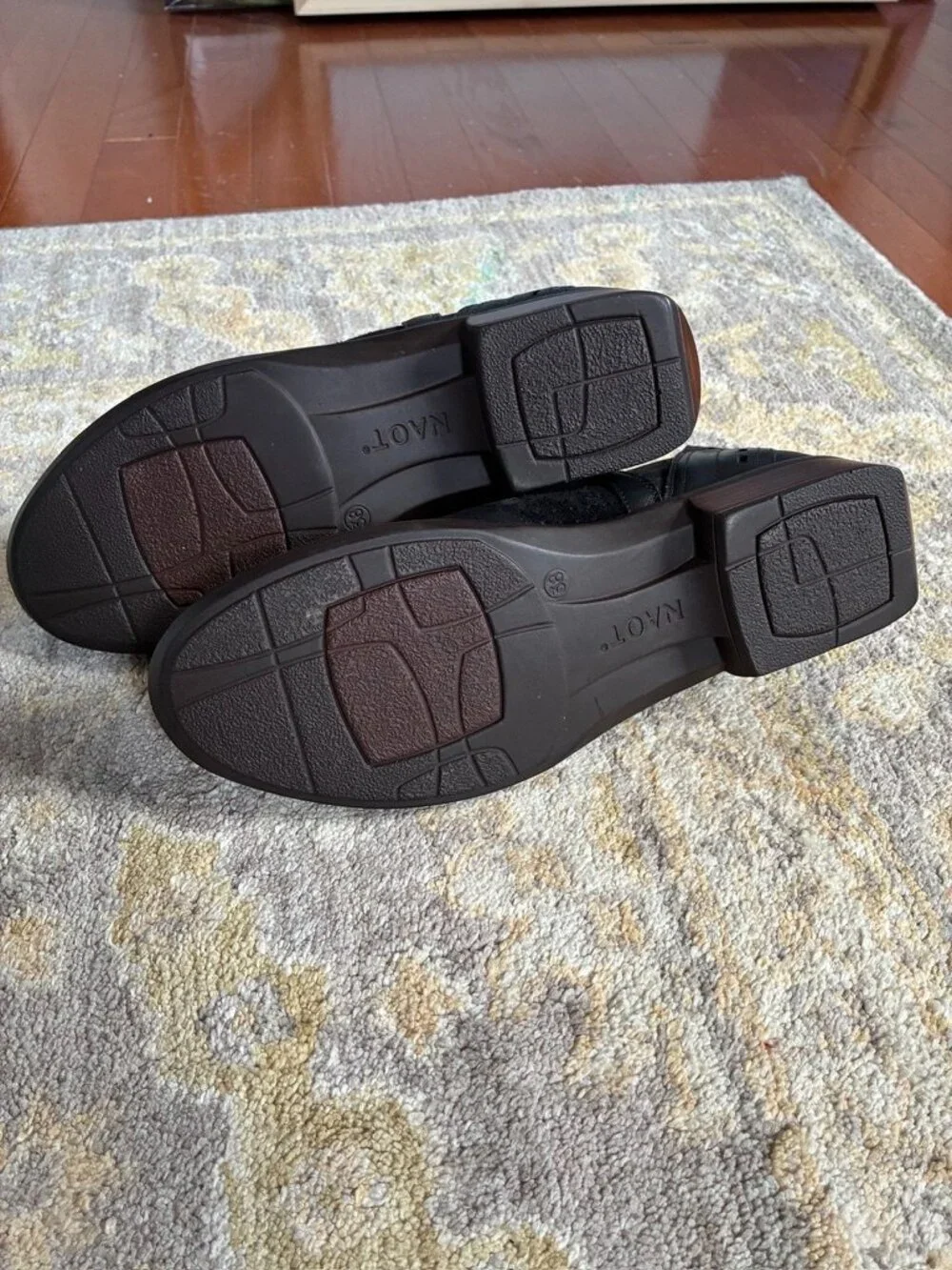 Naot Rivotra ankle booties size 7